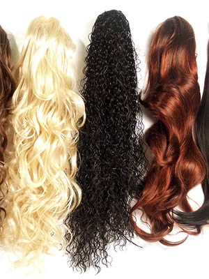 Toupet donna con pinza e code di cavallo